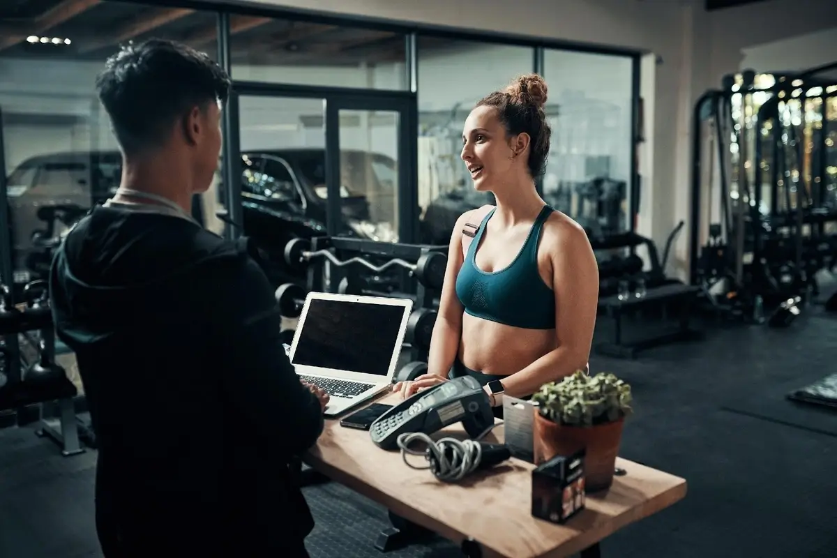 Founders discussing plans in the early days of the gym