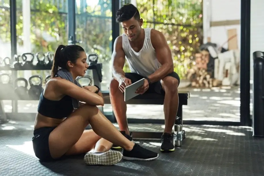 A one-on-one strategy session between a coach and a member